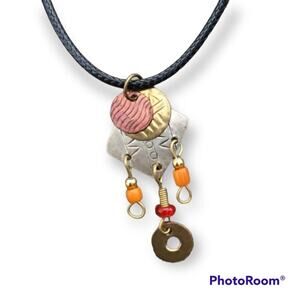 Mixed metals abstract fall tone pendant necklace, waxed black cotton cord